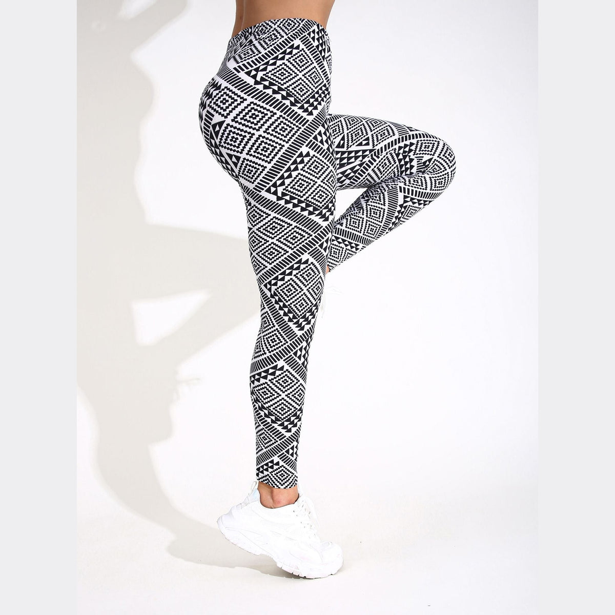 Leggings Keya Block com padrão geométrico em movimento – vista lateral