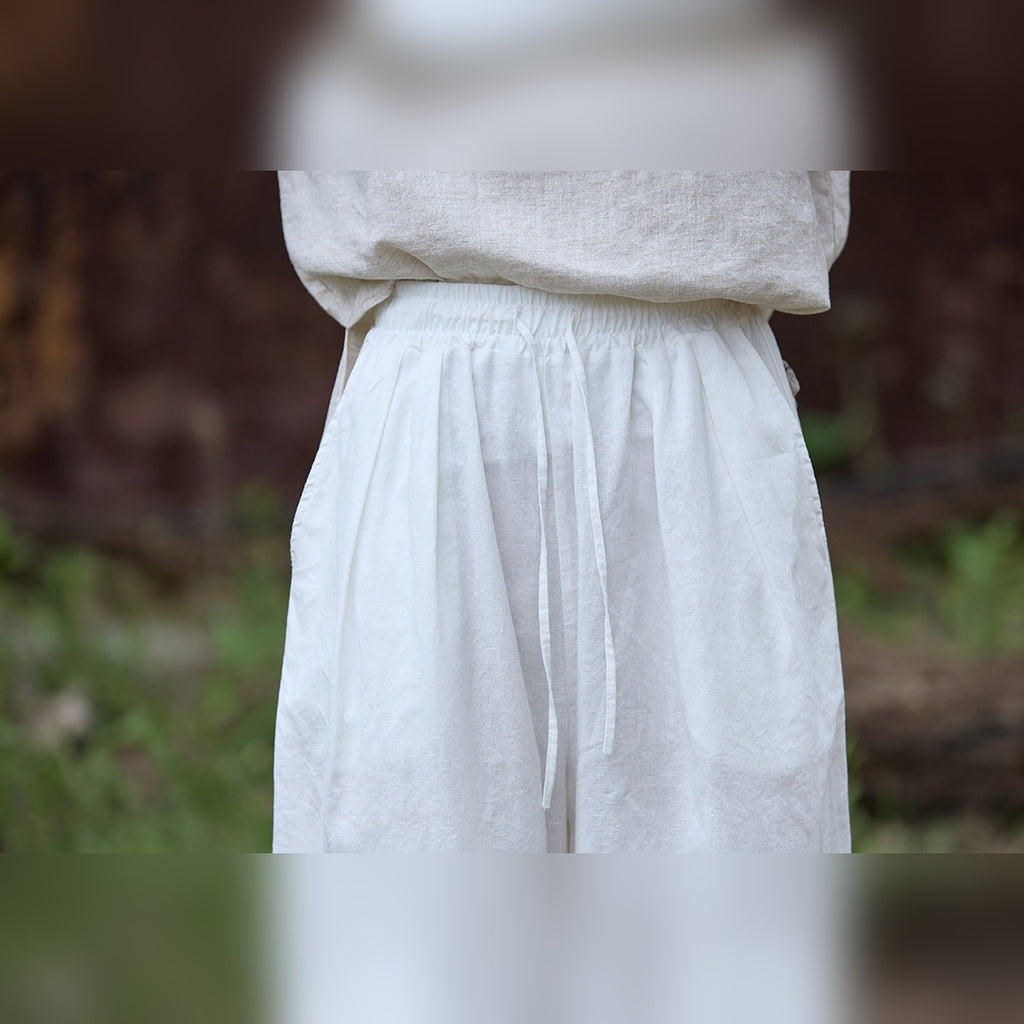 Calças Shalem Cotton em algodão brancas com cós elástico – detalhe