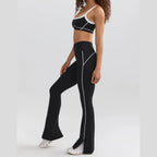 Conjunto Yara Vitality preto com calças à boca de sino – vista lateral