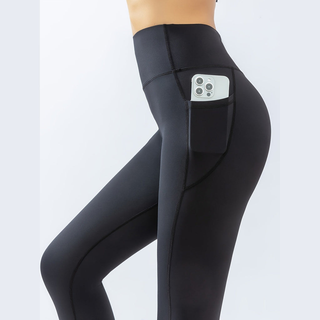 Leggings Prithvi Pants pretas com bolso lateral – vista lateral