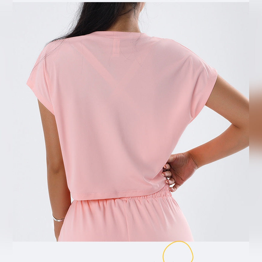 Top desportivo curto Atma Dry rosa de manga caída – vista de frente