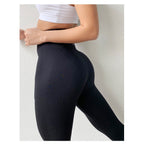Leggings capri NaturaLine pretas com faixas elásticas – detalhe