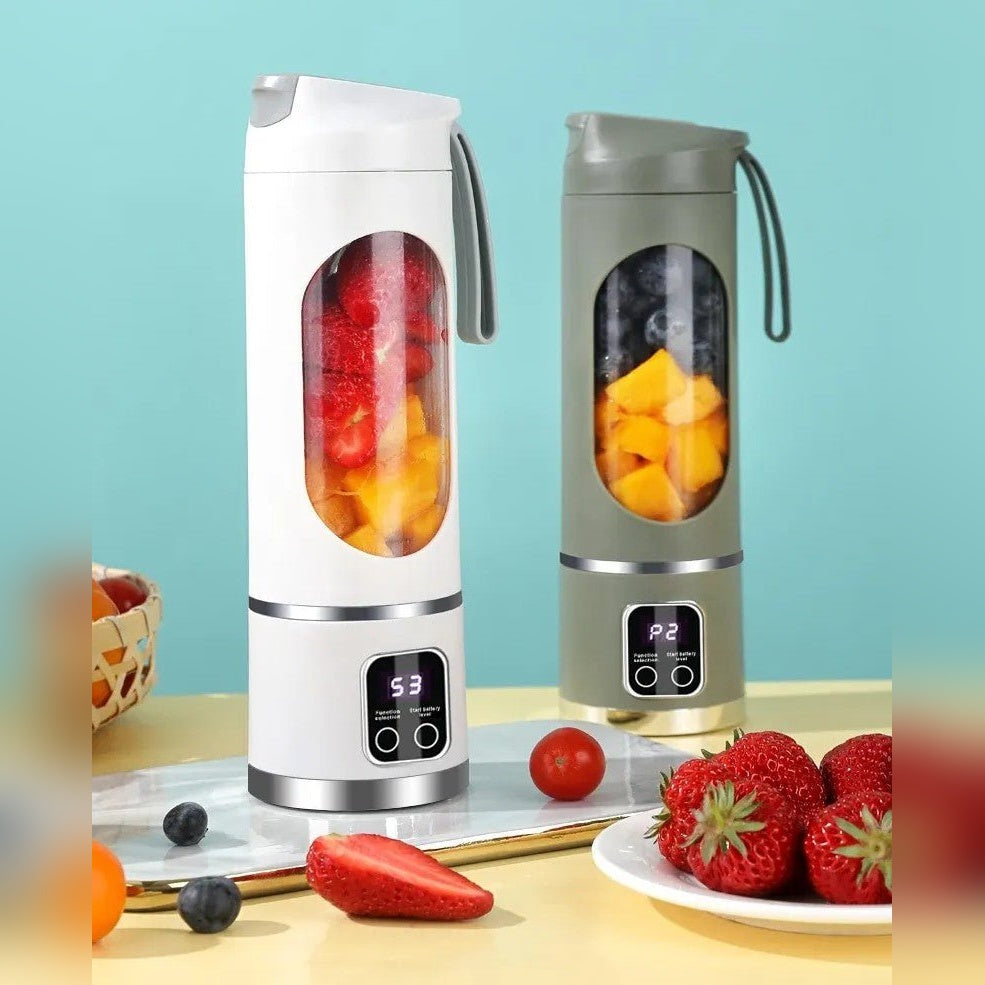 Liquidificadoras portáteis YogaJuice Cup branca e cinzenta com fruta – vista da gama