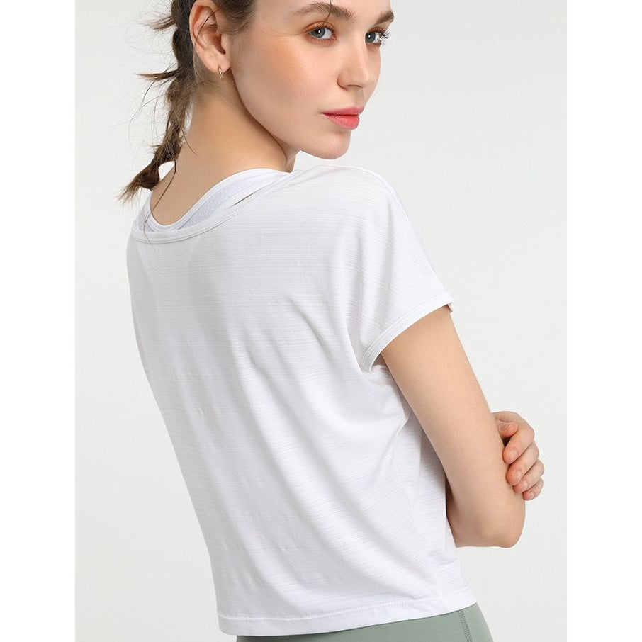 T-shirt curta de yoga branca larga – vista de frente