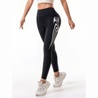 Leggings Alvoa pretas com riscas brancas – vista de frente