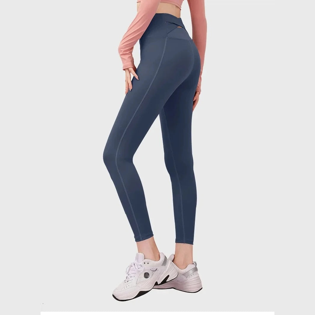 Leggings Anahata Cross azul-escuras de cintura alta – vista de frente