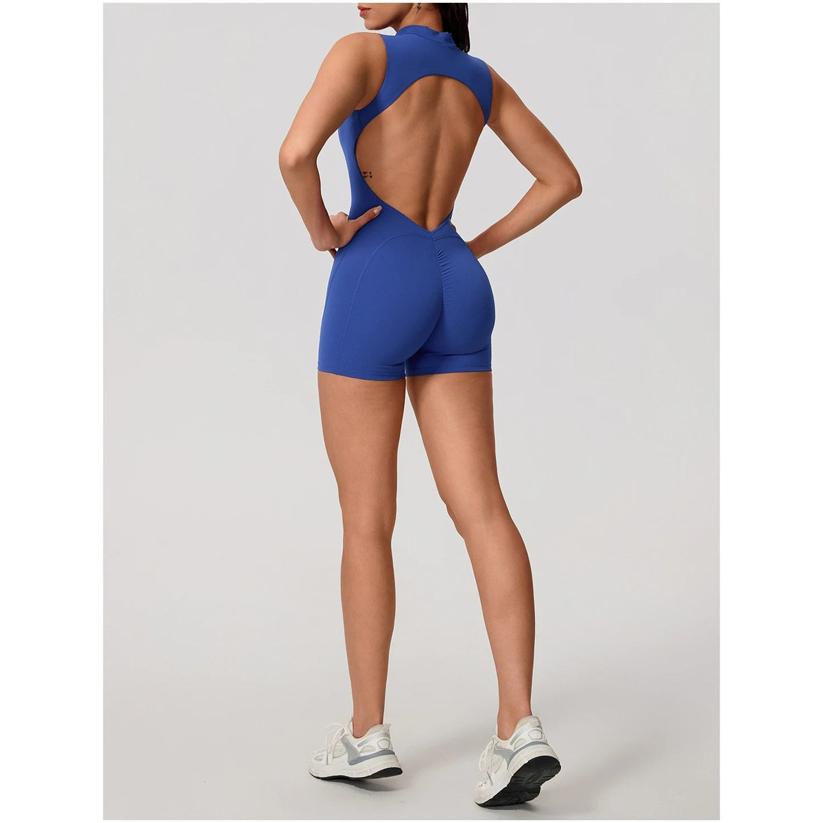 Macacão Moon Veil Sculpt azul de gola alta com costas abertas – vista de costas