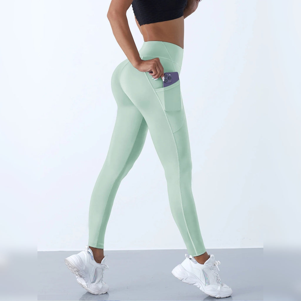 Leggings de yoga com bolsos verde-claras com bolso lateral – vista de costas