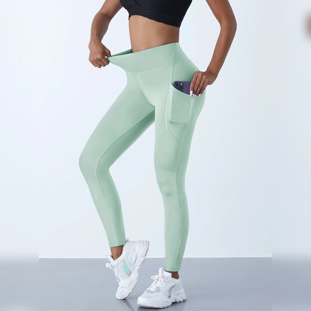 Leggings de yoga com bolsos verde-claras de cintura alta – vista lateral