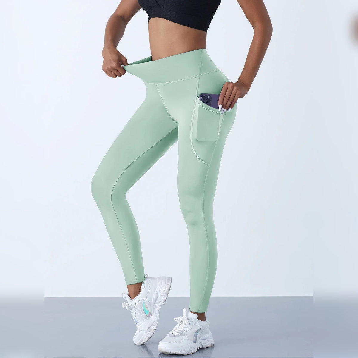Leggings de yoga com bolsos verde-claras de cintura alta – vista lateral