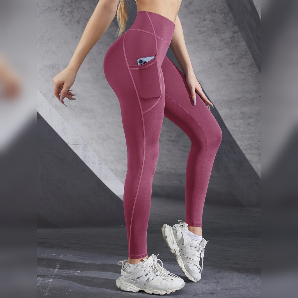 Leggings de yoga com bolsos rosa-escuras com bolso lateral – vista lateral