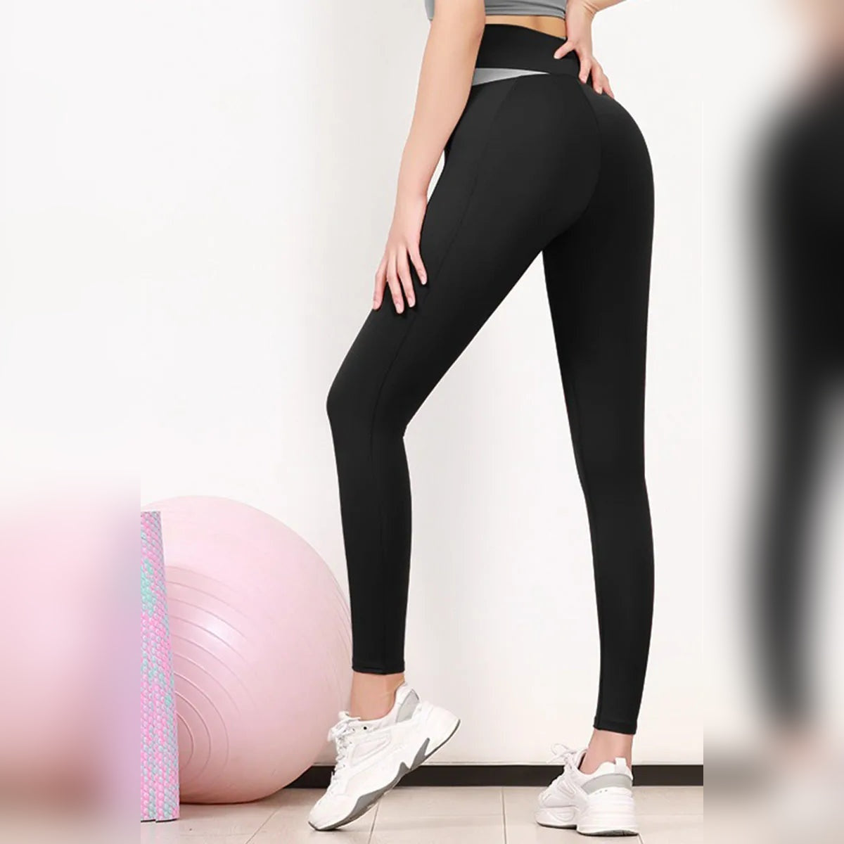 Leggings Zen Peach pretas com cós cruzado – vista lateral