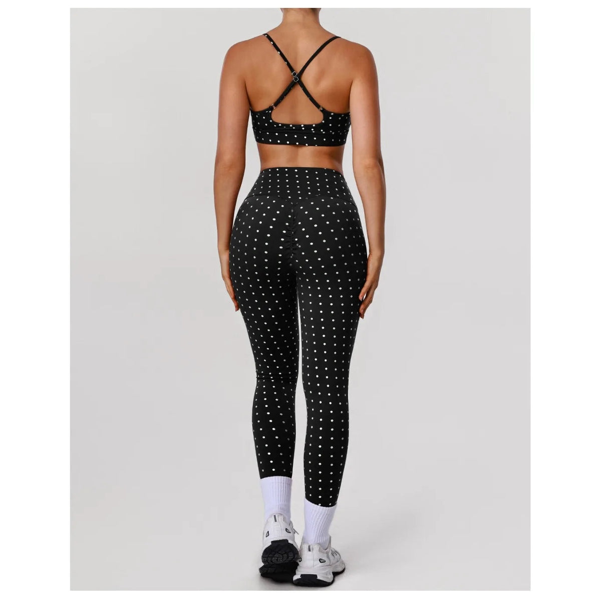 Leggings Starlight Flow pretas com pontos e top de alças cruzadas – vista de costas