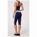 Conjunto Vinyasa Motion azul-marinho com top desportivo – vista de costas