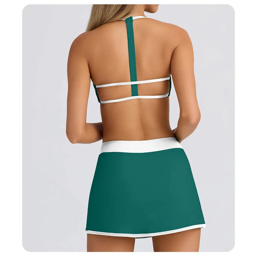 Conjunto Aurea Match com top branco e saia-calção verde-escura – vista de costas