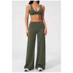 Conjunto Shakti Line verde com top e calças de perna larga – vista de frente