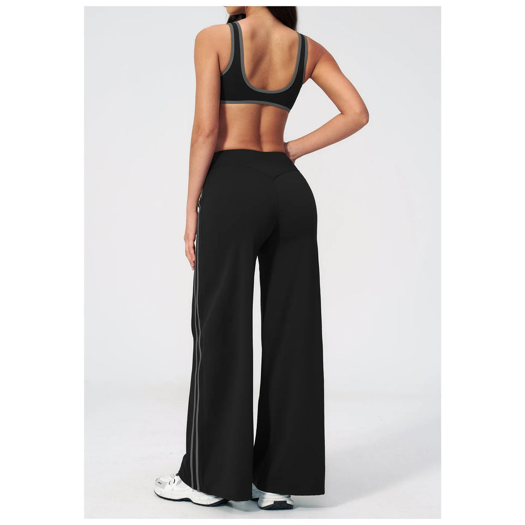 Conjunto Shakti Line preto com calças de perna larga – vista de costas