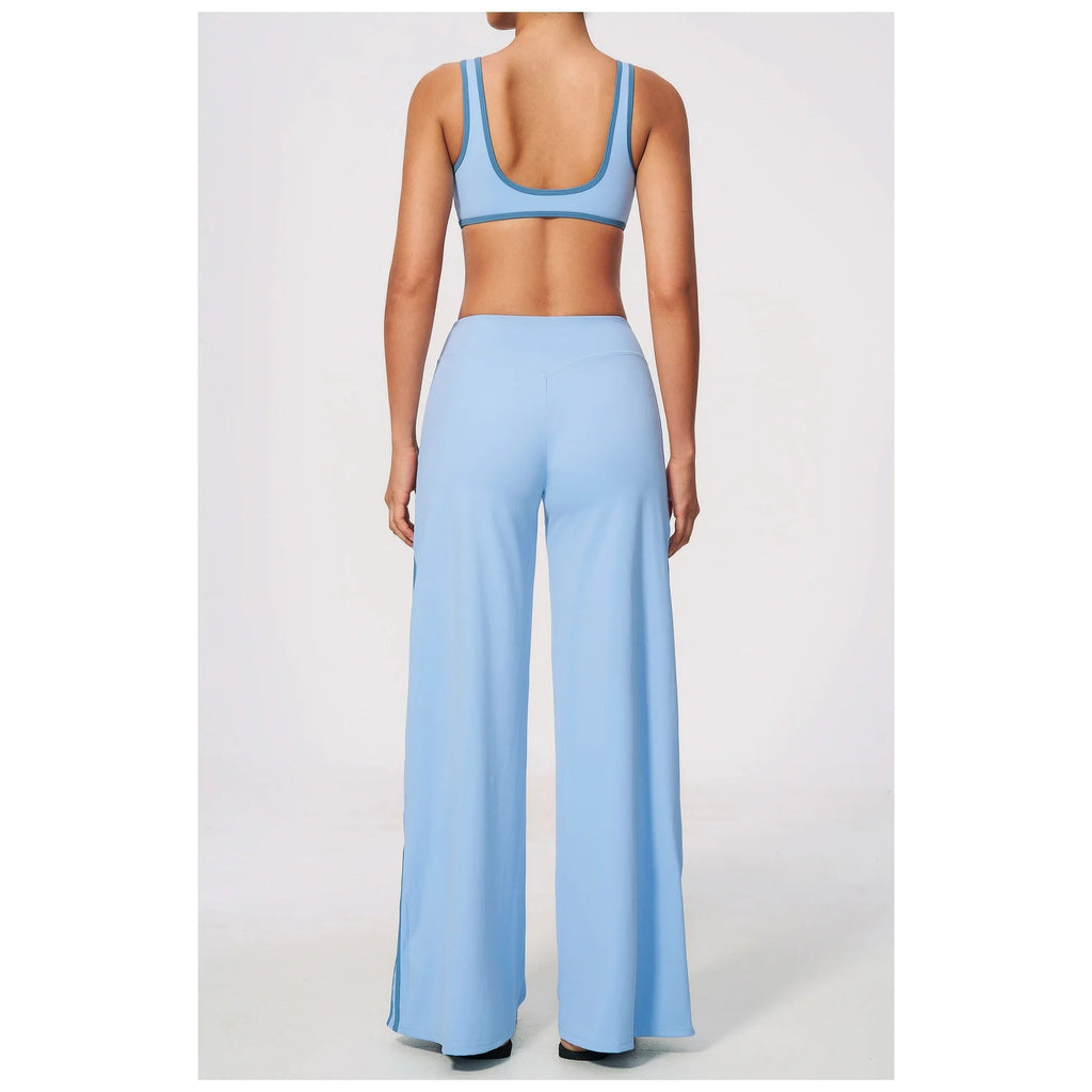 Conjunto Shakti Line azul-claro com top e calças de perna larga – vista de costas