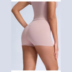 Calções Shakti Move rosa-acinzentados de cintura cruzada – vista lateral de costas