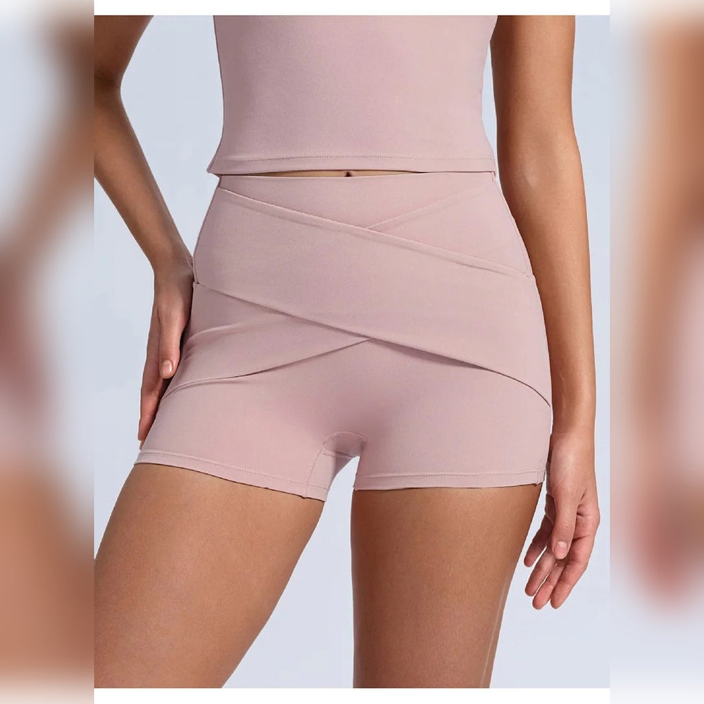 Calções Shakti Move rosa-acinzentados de cintura cruzada – vista de frente