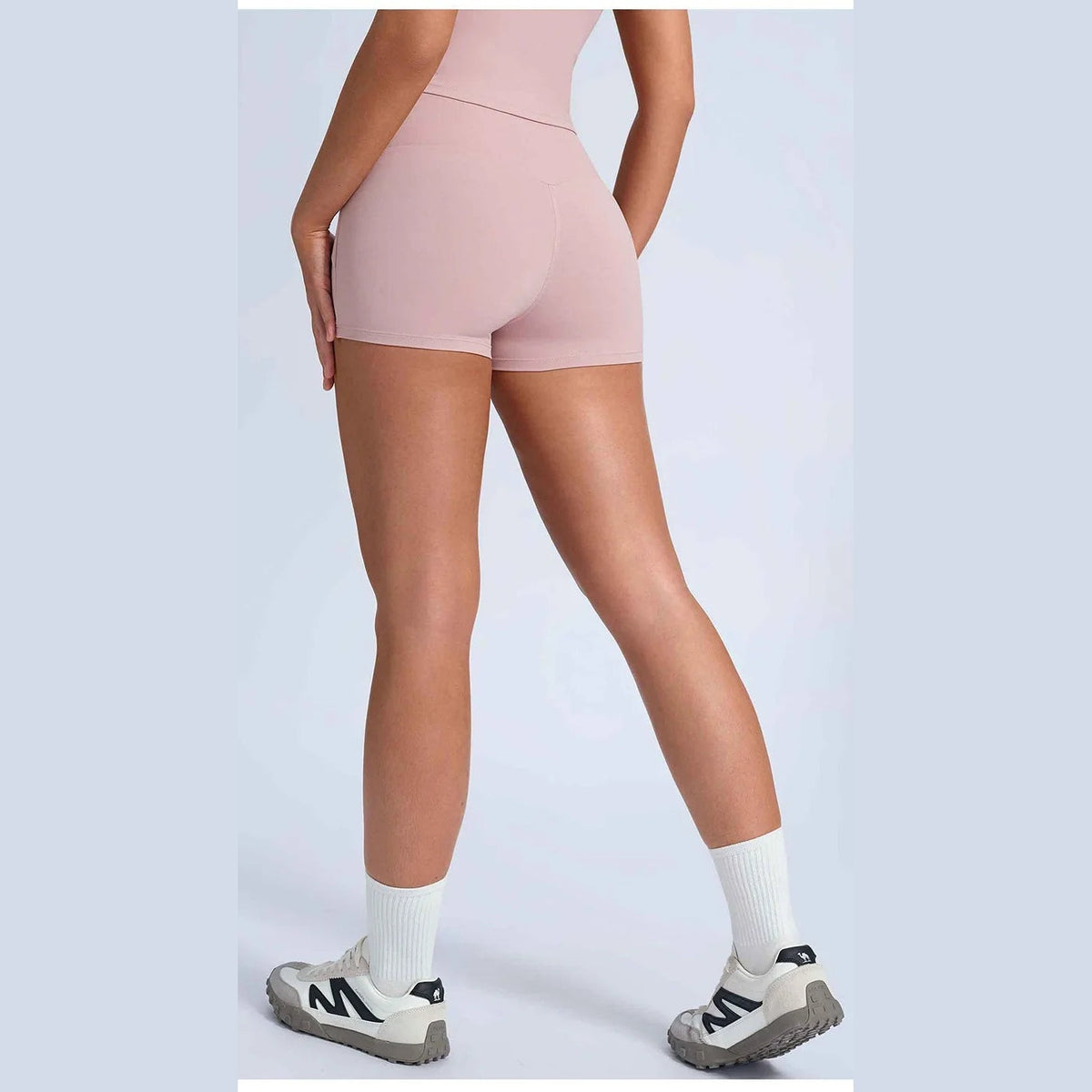 Calções Shakti Move rosa-acinzentados com top a condizer – vista de costas