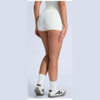 Calções Shakti Move branco-bege – vista de costas