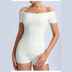 Conjunto Shakti Move branco-bege com top de ombros descobertos – vista de frente
