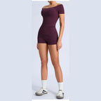 Conjunto Shakti Move roxo-violeta com top de ombros descobertos – vista de frente