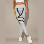 Leggings Shakti Motion com padrão geométrico e top a condizer – vista de frente
