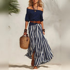 Conjunto feminino boho de top com mangas bufantes e saia comprida às riscas – fotografia 8