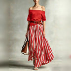 Conjunto feminino boho de top com mangas bufantes e saia comprida às riscas – fotografia 19