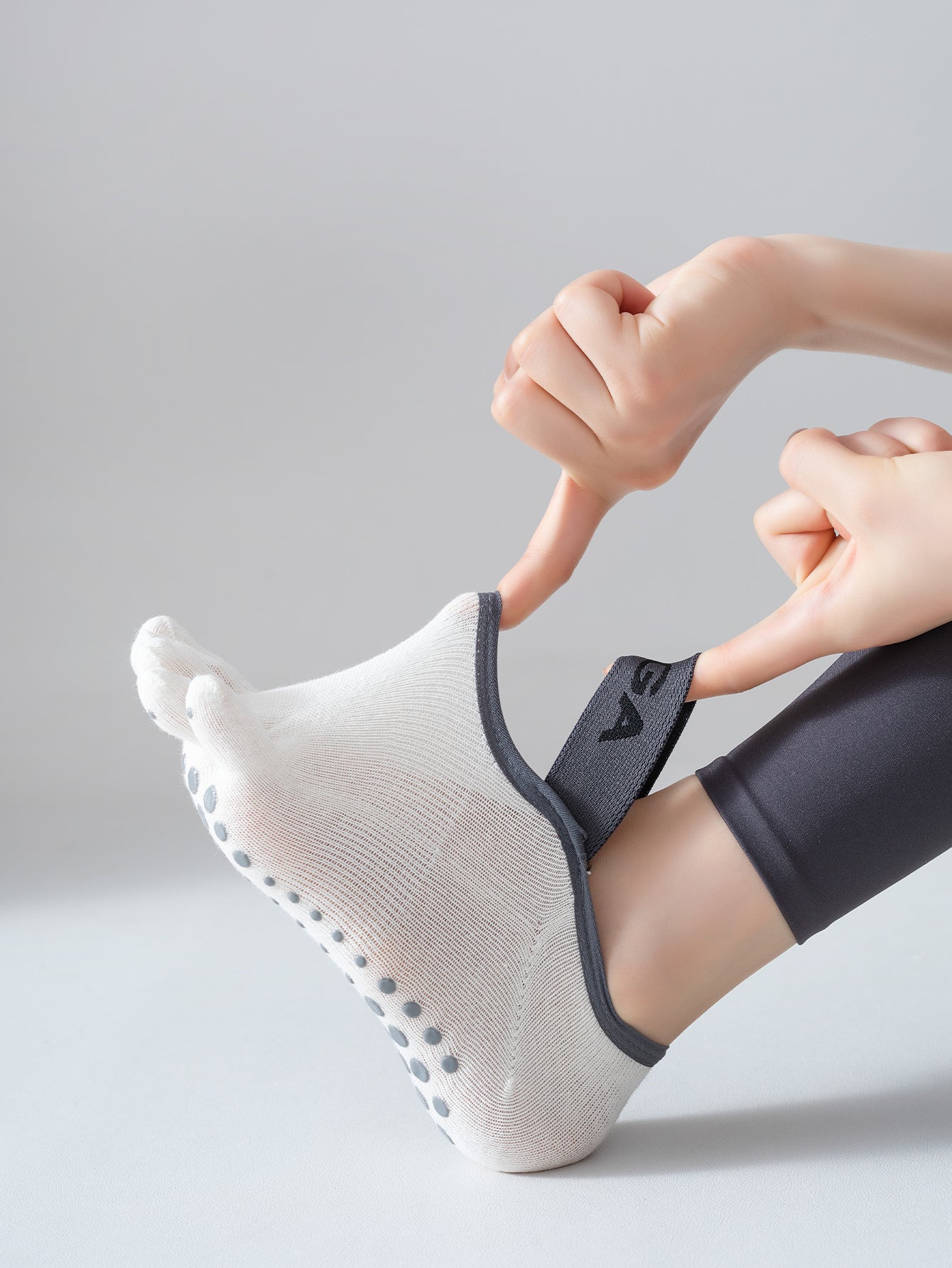 Calcetines de yoga de cinco dedos para mujer