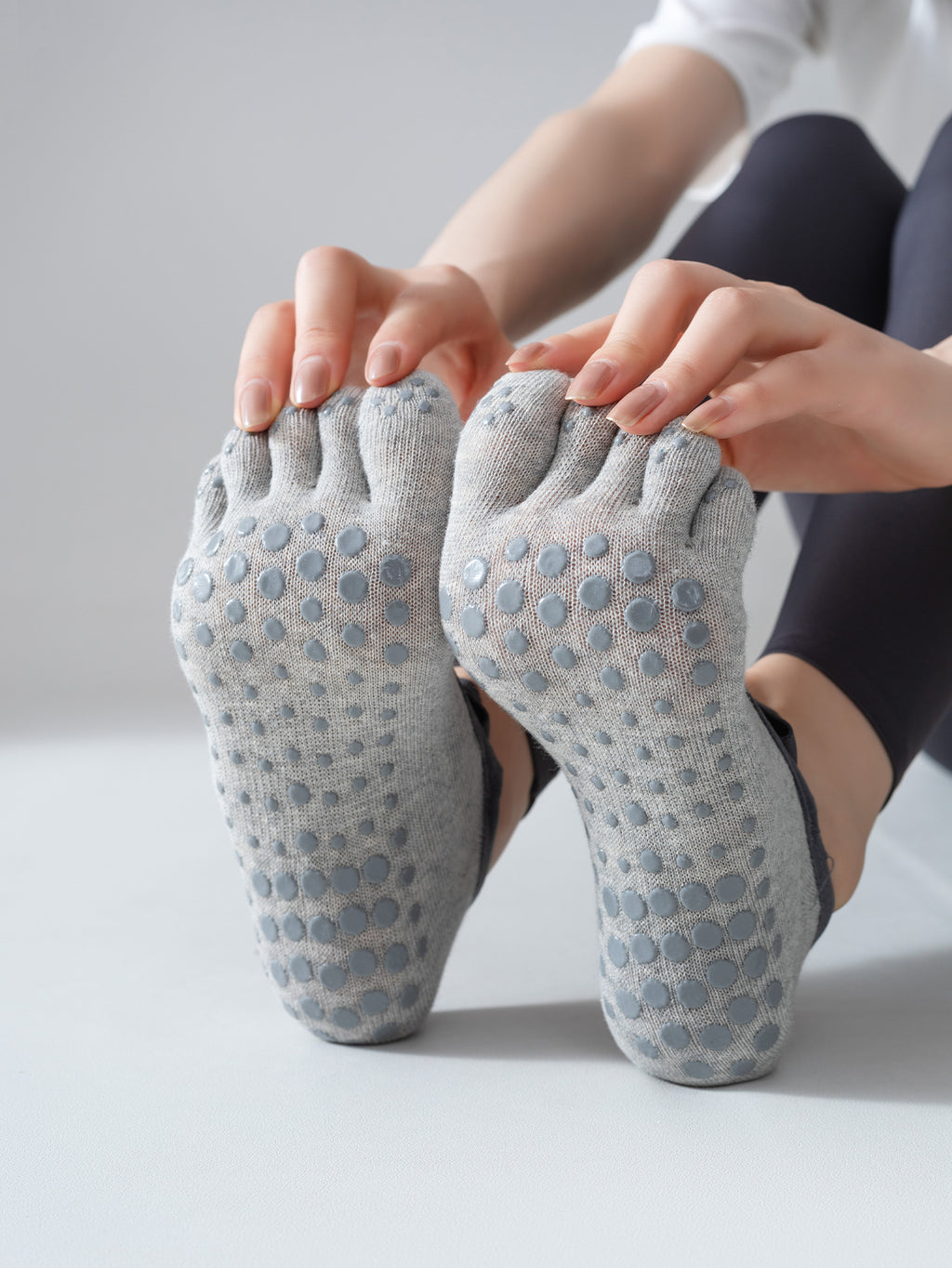 Calcetines de yoga de cinco dedos para mujer