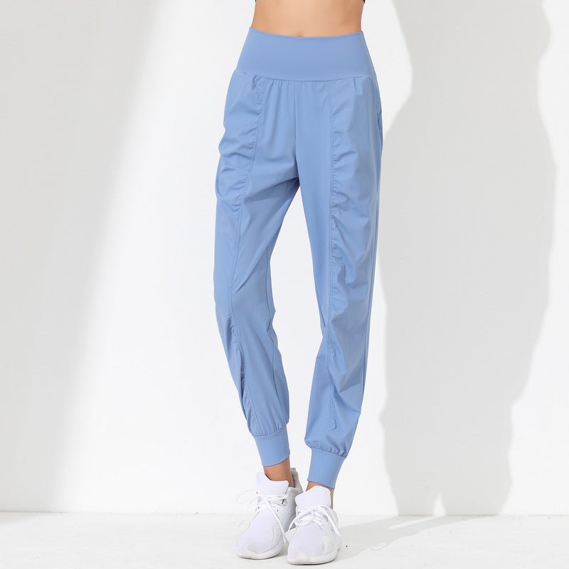 Pantalones de yoga sueltos y moldeadores para mujer - Secado rápido, bajo plisado y bolsillos laterales