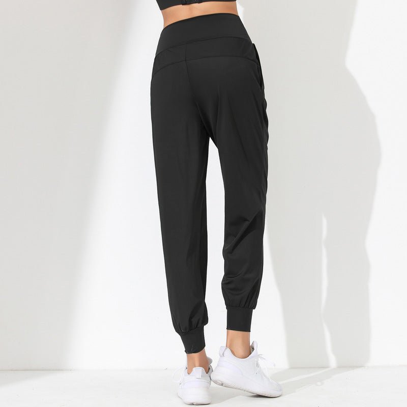 Pantalones de yoga sueltos y moldeadores para mujer - Secado rápido, bajo plisado y bolsillos laterales