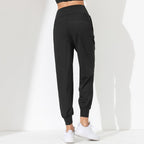 Pantalones de yoga sueltos y moldeadores para mujer - Secado rápido, bajo plisado y bolsillos laterales