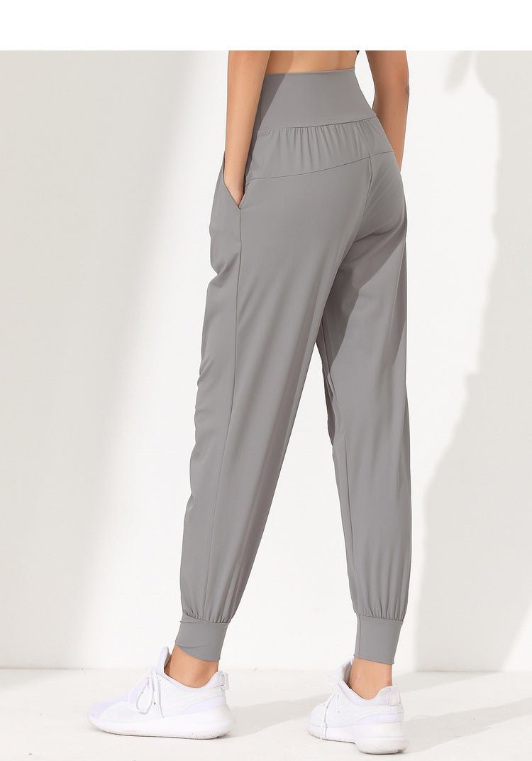 Pantalones de yoga sueltos y moldeadores para mujer - Secado rápido, bajo plisado y bolsillos laterales