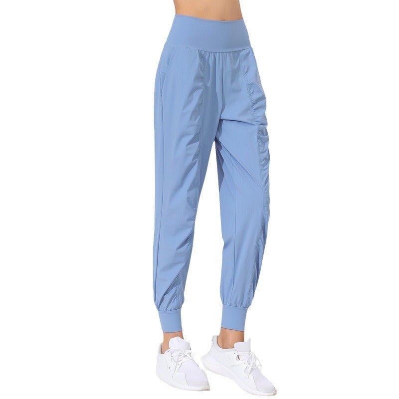 Pantalones de yoga sueltos y moldeadores para mujer - Secado rápido, bajo plisado y bolsillos laterales