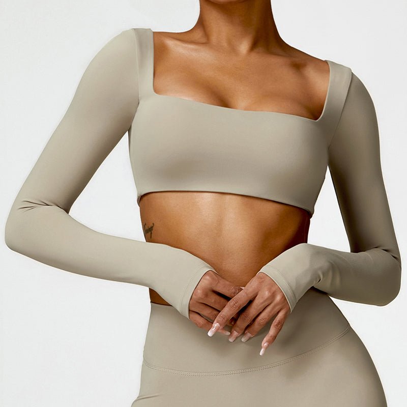 Sutra Fit – Blusa de rendimiento con diseño femenino para movimiento y confort