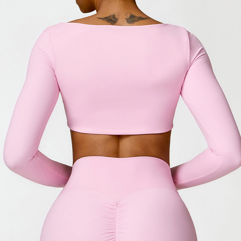 Sutra Fit – Blusa de rendimiento con diseño femenino para movimiento y confort