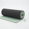 Tapete TPE Om Serenity cinzento e verde enrolado – vista do produto