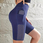 Elementa Glide — Shorts de punto de cintura alta con bolsillo invisible y estilo contemporáneo