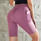 Elementa Glide — Shorts de punto de cintura alta con bolsillo invisible y estilo contemporáneo