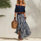 Conjunto feminino boho de top com mangas bufantes e saia comprida às riscas – fotografia 1