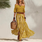 Conjunto feminino boho de top com mangas bufantes e saia comprida às riscas – fotografia 3