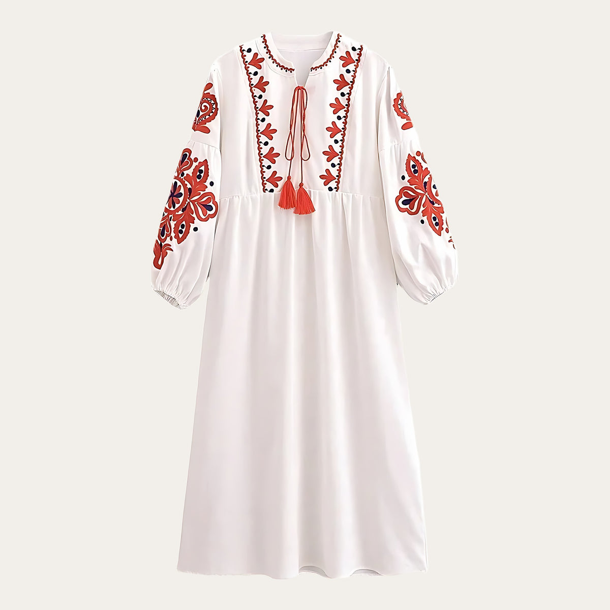 Vestido boho comprido Kalinda branco com bordado floral e borlas vermelhas