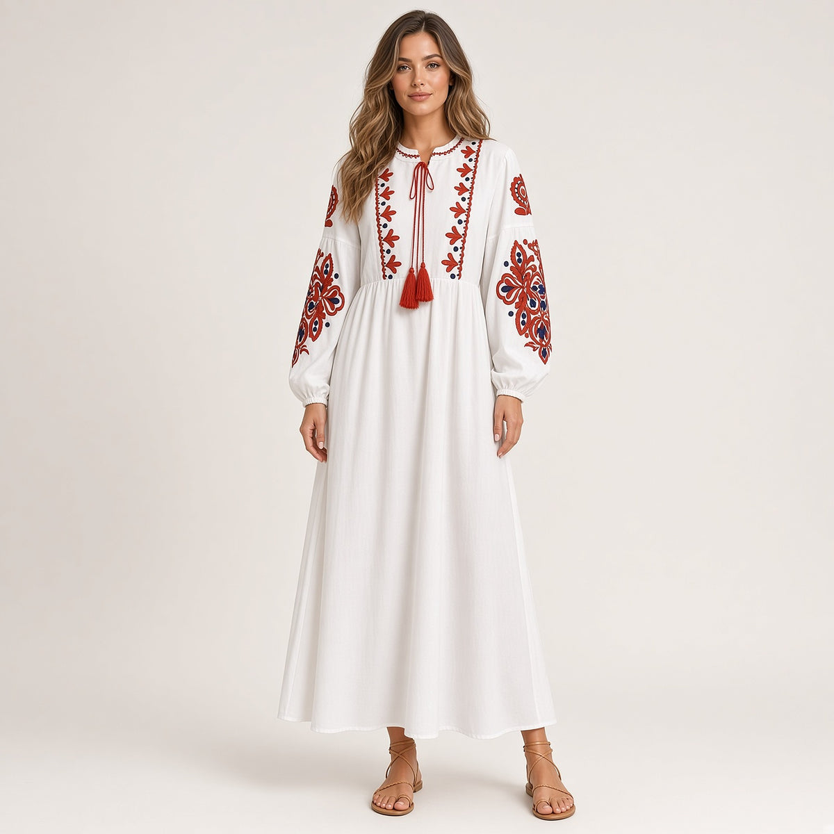 Kalinda – vestido boho comprido branco com bordado floral vermelho e mangas balão