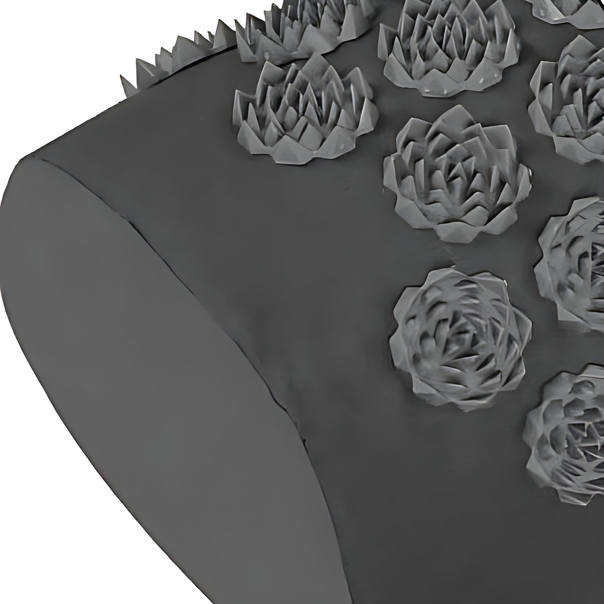 Detalhe da almofada de acupressão com flores de lótus